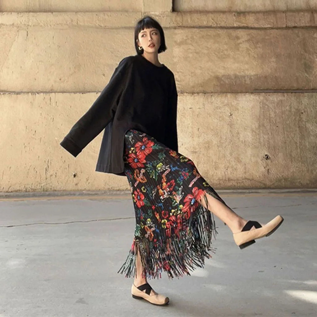 European and American style fold print design sense fringe skirt women's spring and summer new high-waisted fashion hundred half