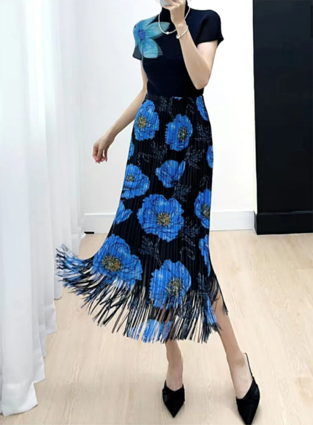 European and American style fold print design sense fringe skirt women's spring and summer new high-waisted fashion hundred half